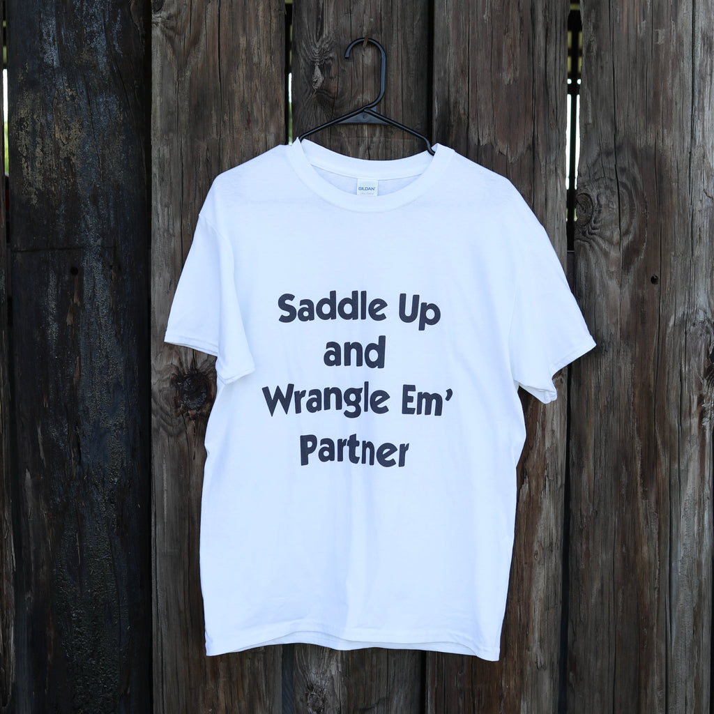 “Saddle Up And Wrangle Em’ Partner” Tee